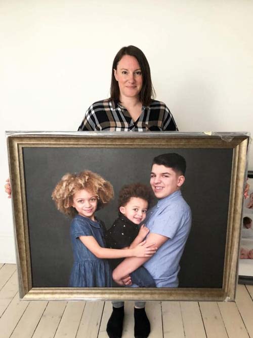 Canvas print of family portrait with sibling, brone frame taken by seona misumi photography a glasgow family photographer